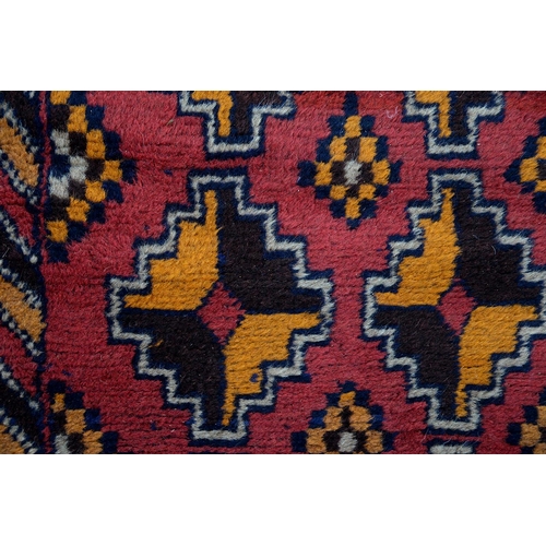 930 - An Afghan Baluch rug, 135 x 84cm