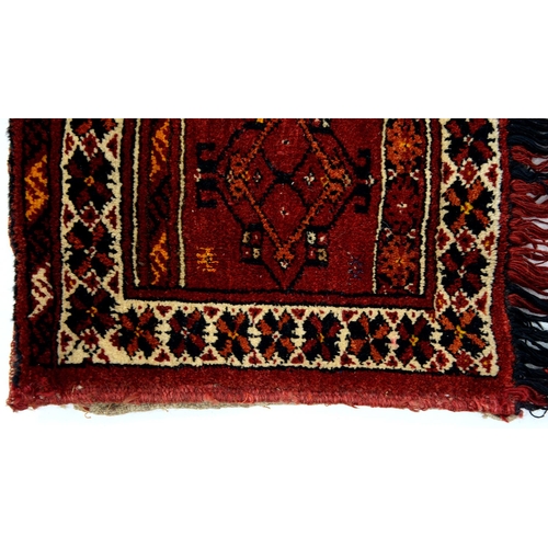 937 - An Ersari Turkman torba bag, with plain weave back, 135 x 35cm (excluding tassels)