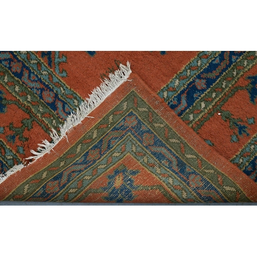 940 - A Turkish / Indian Ushak style carpet, 407 x 511cm