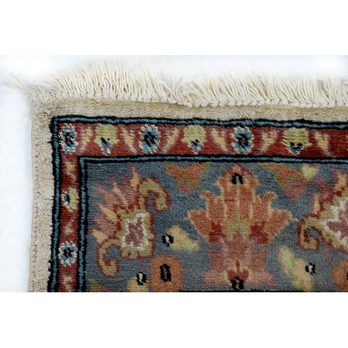 941 - An Indian part silk piled rug, 190 x 126cm