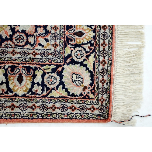 948 - An Indian Kashmir art silk rug, 149 x 94cm