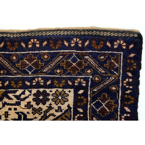 952 - A Persian Baluch rug, 127 x 82cm