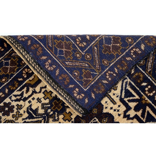 952 - A Persian Baluch rug, 127 x 82cm