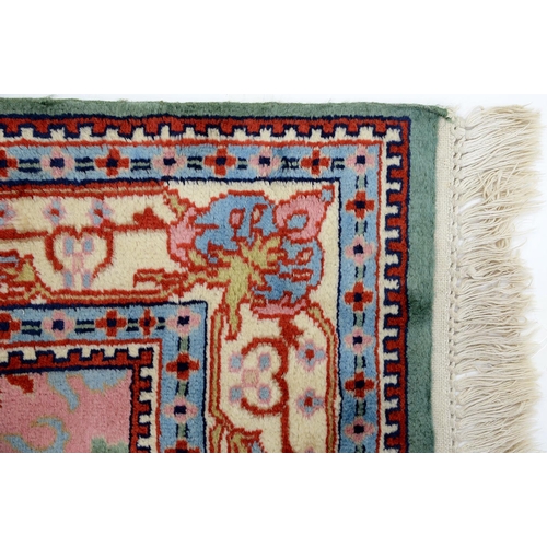 955 - An Indian rug, 153 x 90cm