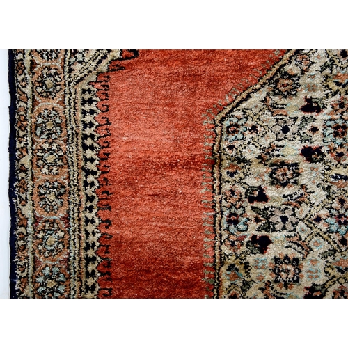 957 - A Persian Ghom silk rug, 81 x 55cm