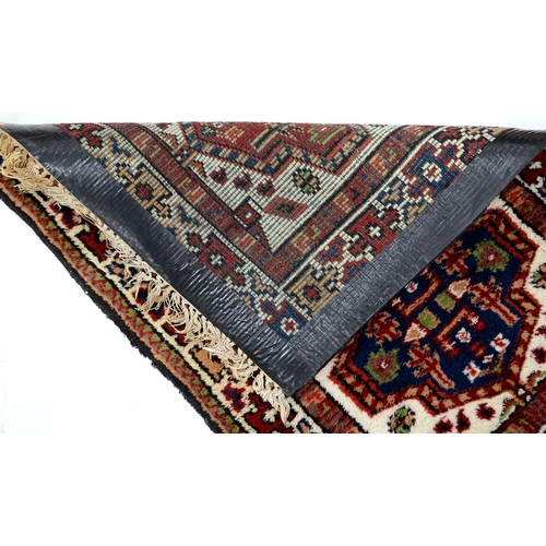 958 - Two Persian mats, 86 x 63cm and 80 x 56cm