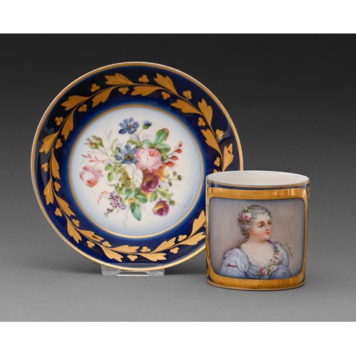 481 - A French porcelain coffee can and a saucer, early 20th c, painted with a portrait of a young woman, ... 