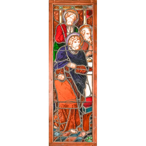 704 - A Victorian stained glass window light of three saints, 188 x 61.5cm including wood frame... 