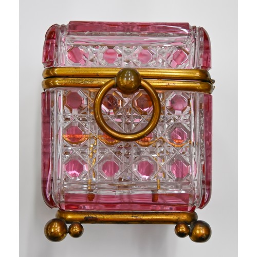 453A - A French gilt lacquered brass mounted pink flashed and cut glass scent casket and set of six square ... 