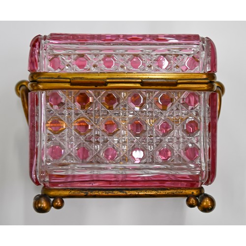 453A - A French gilt lacquered brass mounted pink flashed and cut glass scent casket and set of six square ... 