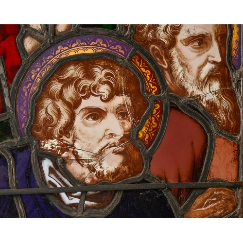 704 - A Victorian stained glass window light of three saints, 188 x 61.5cm including wood frame... 