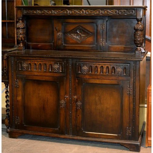 608 - A carved and stained oak livery cupboard, in 17th c style, 138cm h; 64 x 137cm