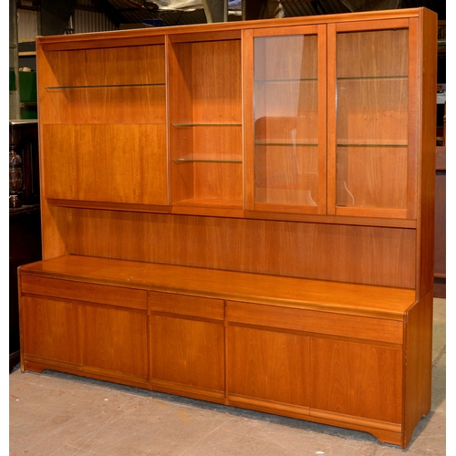 609 - A William Lawrence teak Model 700 wall unit, c1970, 209cm l