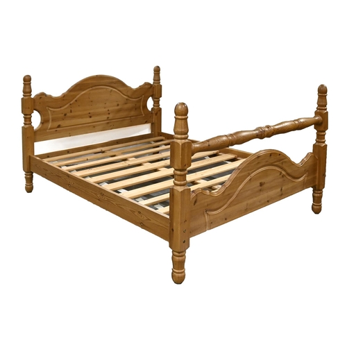 619 - A waxed pine double bed, 194 x 160cm