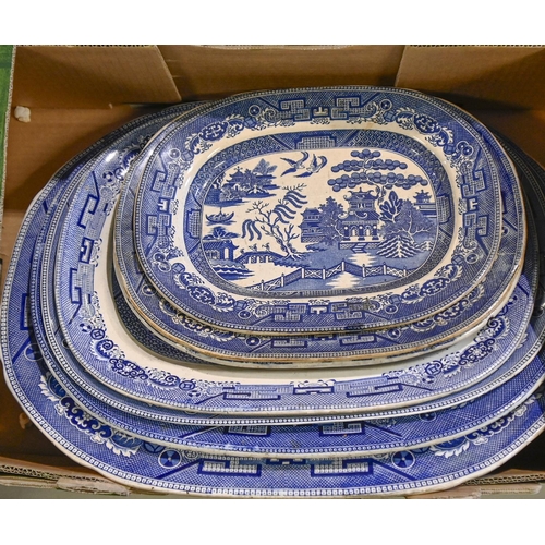 513 - A quantity of Booths Willow pattern and other blue and white dinner ware, etc, early 20th c and late... 