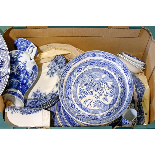 513 - A quantity of Booths Willow pattern and other blue and white dinner ware, etc, early 20th c and late... 