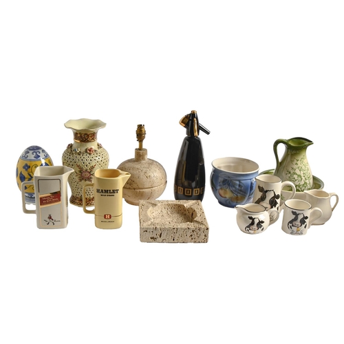 571 - Miscellaneous decorative and other ceramics, including Wade Whisky jugs, a novelty cow teapot, Poole... 