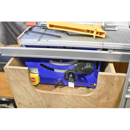 602 - An Elektra Beckum table saw, mounted in plywood bench, 110 x 108cm