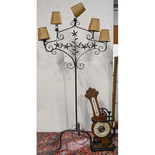 623 - A wrought iron five branch standard lamp, 165cm h, a wrought iron stick stand and oak barometer... 