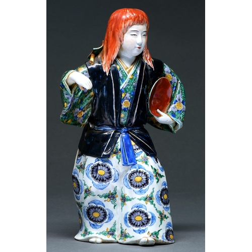 495 - A Chinese famille rose figure of an immortal, 20th c,  in green and lavender robe, 24cm h, impressed... 