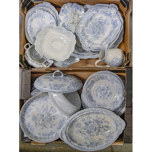 1158 - An extensive earthenware blue and white printed dinner service, late 19th c, including tureens and c... 