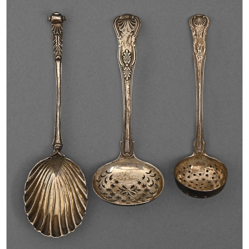 155 - Two Victorian silver sugar sifters and a serving spoon with shell bowl, London, Exeter and Edinburgh... 