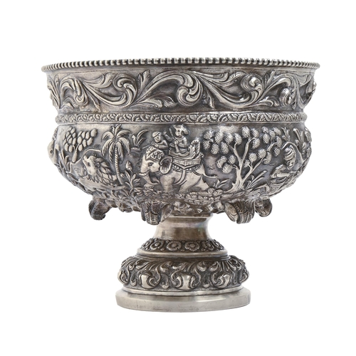 250 - An Indian silver repousse footed bowl, Lucknow, late 19th c, chased in high relief with hunting scen... 