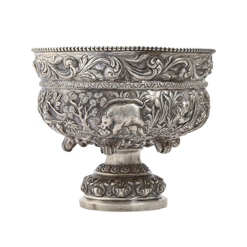 250 - An Indian silver repousse footed bowl, Lucknow, late 19th c, chased in high relief with hunting scen... 