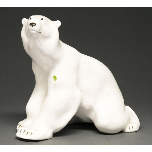 385 - A glazed porcelain model of a polar bear, 26cm h