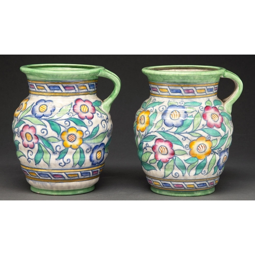 393 - Charlotte Rhead. A pair of Crown Ducal tube lined Caliph pattern jugs, 1937-1939, 21cm h, printed ma... 