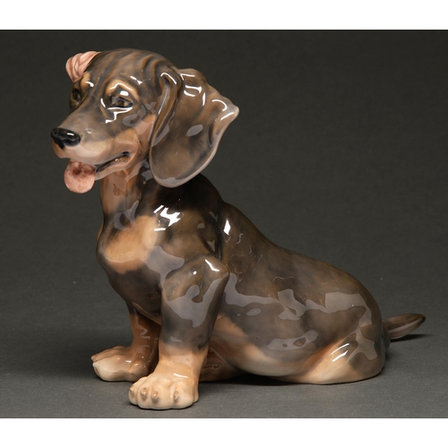 483 - A Royal Copenhagen porcelain model of a Dachshund, 18cm h, painted and printed marks... 