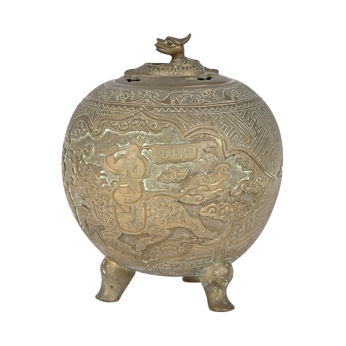 571 - A Chinese bronze tripod vessel and cover, c1900, of spherical form, cast in relief and engraved with... 