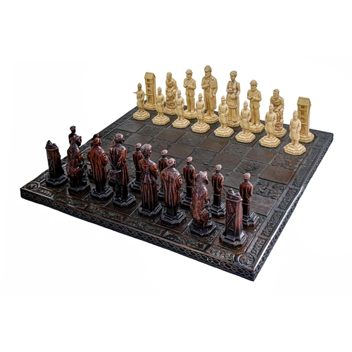 617A - Sherlock Holmes. A figural resin chess set, late 20th c, with villain and policeman pawns, the rooks... 