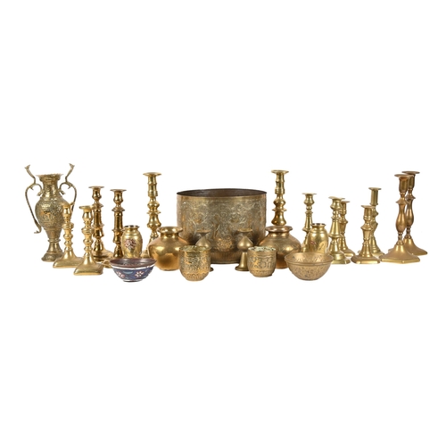 622 - Miscellaneous Victorian and later brass candlesticks, an Indian engraved brass jardiniere, a two han... 