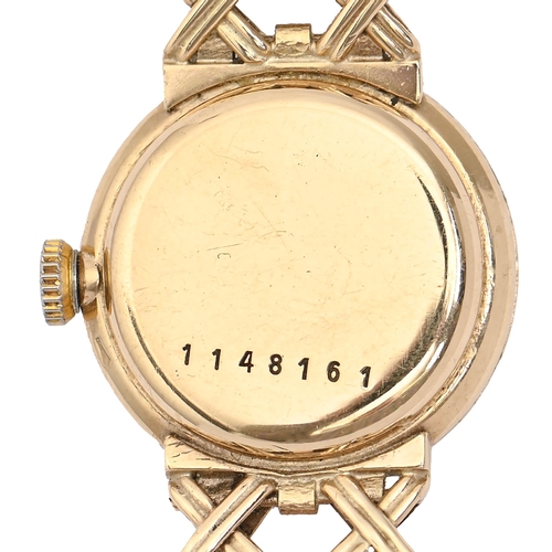 63 - A Jaeger LeCoultre gold lady's wristwatch, 20mm diam, marked on case back 1148161, on associated gol... 