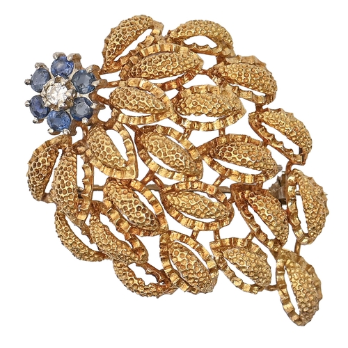 68 - A sapphire and diamond brooch, in 18ct gold, 43mm l, import marked London, c1975, 11.4g... 