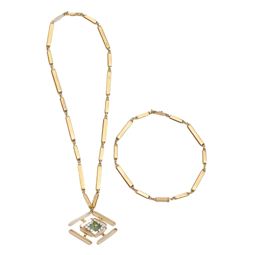 72 - An emerald and diamond pendant, in 18ct gold, on integral necklet and two further sections of matchi... 