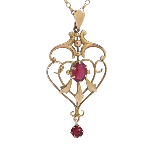 83 - A synthetic ruby openwork pendant, early 20th c, in gold, 43mm, marked 9ct, on gold necklet, 4g... 