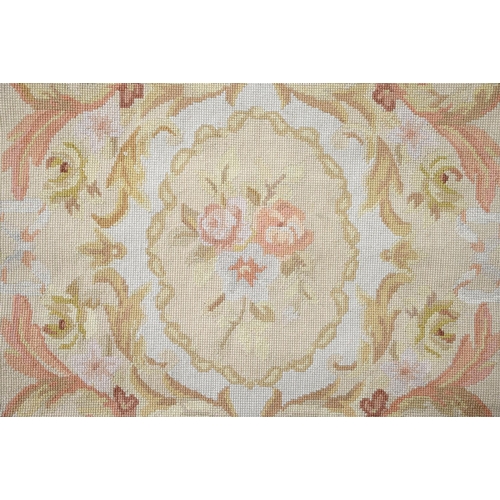 910 - An Aubusson needlepoint rug, 153 x 92cm