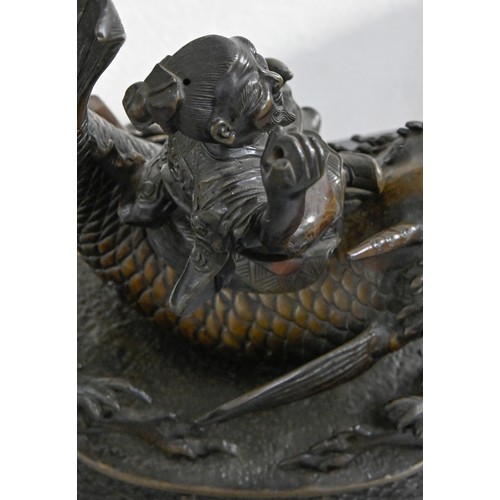 593 - A Japanese bronze censer in the form of Kinko riding a carp, Meiji period, 32cm h; 22cm w... 