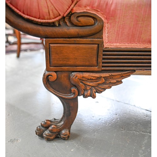 962 - A Northern European carved mahogany settee, mid 19th c, in Empire style, 155cm l