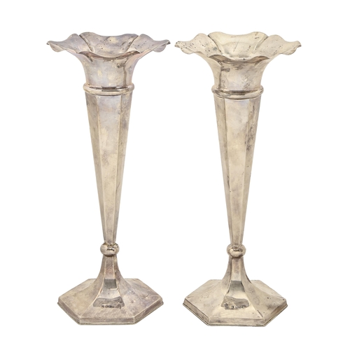 403 - World War One. A pair of George V silver vases, on hexagonal foot, 29cm h, by James Deakin & Son... 