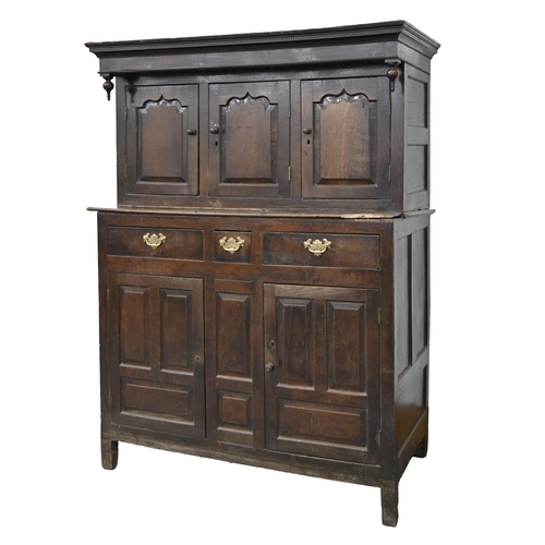 1081 - A Welsh oak cwpwrdd deuddarn, Montgomeryshire, 18th c, with ogee or rectangular raised-and-fielded p... 