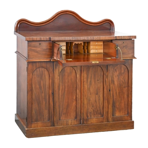 1152 - A Victorian mahogany breakfront secretaire sideboard, the lower part enclosed by panelled doors, 120... 