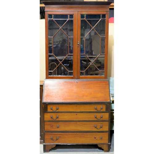 1212 - A mahogany bureau bookcase, early 20th c, on bracket feet, 203cm h; 94 x 45cm