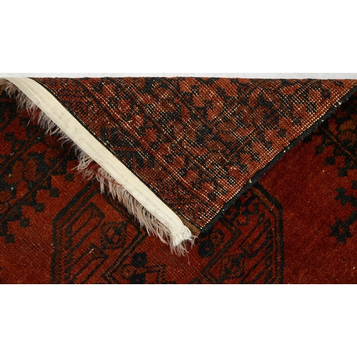 1038 - Three Afghan rugs, 131 x 73cm and smaller