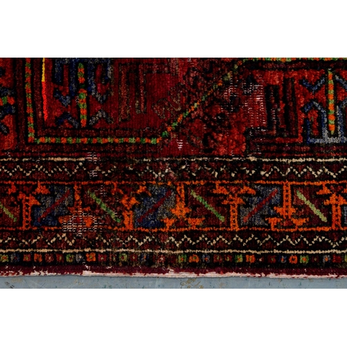 1042 - A Persian rug, 228 x 136cm and two runners, 294 x 102cm and smaller
