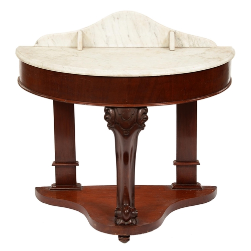 1079 - An early 20th c mahogany semi-circular wash stand with marble top, 72cm h, 91cm w