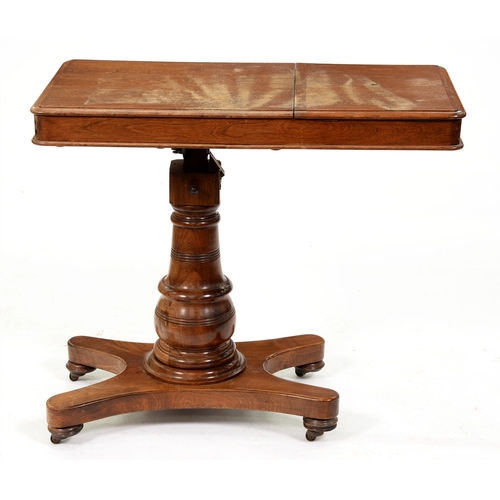 1095 - A late Victorian adjustable reading table,  on pedestal base and turned pillar, ivorine trade label ... 