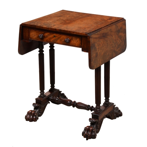 1102 - A Victorian mahogany drop leaf work table, on four reeded pillars, carved stretcher base and claw fe... 